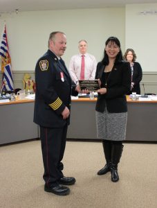 Former Sooke Fire Chief Steve Sorensen (retired) accepts recognition plaque from Mayor Maja Tait. [Photo: March 13, 2017 by West Shore Voice News]