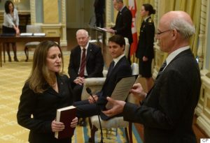 Chrystia Freeland is sworn in as Minister of Foreign Affairs as Prime Minister Justin Trudeau and Gov.-Gen. David Johnston look on during a ceremony at Rideau Hall in Ottawa, Tuesday, Jan.10, 2017. THE CANADIAN PRESS/Adrian Wyld