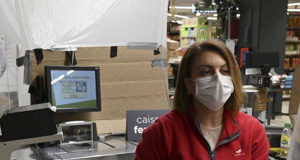 Langford urges local businesses to apply COVID-19 safety measures cashier wearing mask