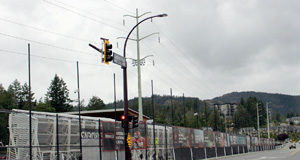 Flag stands empty alongside stadium as COVID-19 digs deeper into mass gatherings flag stands, Langford Parkway, June 2020