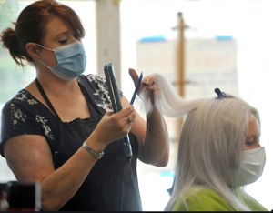 hair stylist, customer, wearing masks