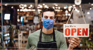 NDP: small businesses being failed by federal COVID supports restaurant worker, mask
