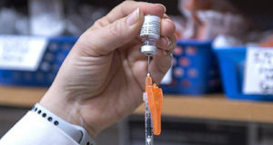 Four COVID vaccines approved for use in Canada vaccine, syringe