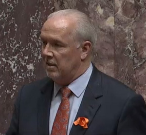 Premier John Horgan, orange ribbon