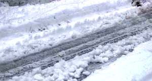 Overnight snowfall produced power outages, snowdays snow, road