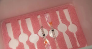 Foam COVID-shot delivery trays developed at Camosun College covid vaccine, trays, syringe