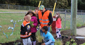 School planting project beautifies Langford city boulevard students, millstream, planting