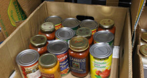 Goldstream Food Bank holiday season hampers assembled by volunteers tomato sauce, food hamper