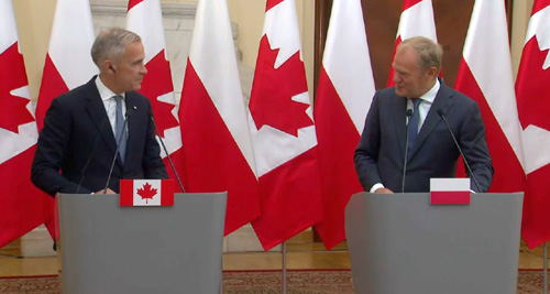 Carney&Tusk-Aug2525-podiums-500px Carney, Tusk, Poland